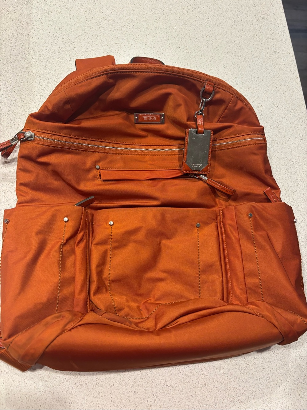 Tumi Orange Nylon Backpack with Front Pockets